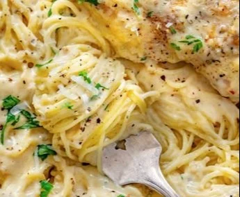 Delicious Crock Pot Angel Chicken served with creamy sauce