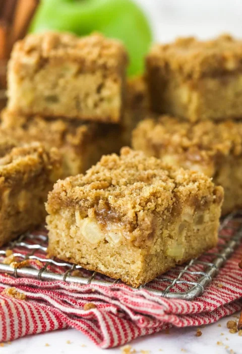 Delicious homemade Apple Streusel Bars ready to serve on a plate