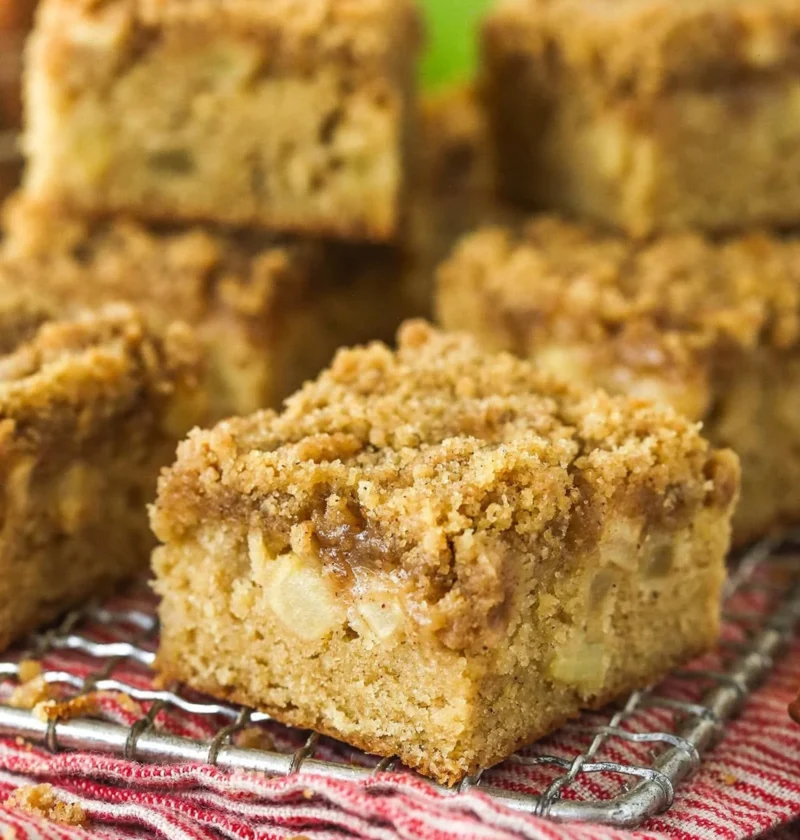 Delicious homemade Apple Streusel Bars ready to serve on a plate