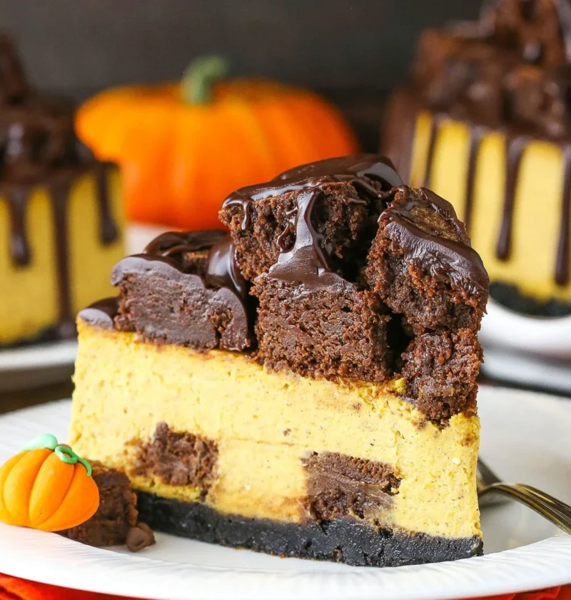 Decadent chocolate pumpkin cheesecake slice on a plate