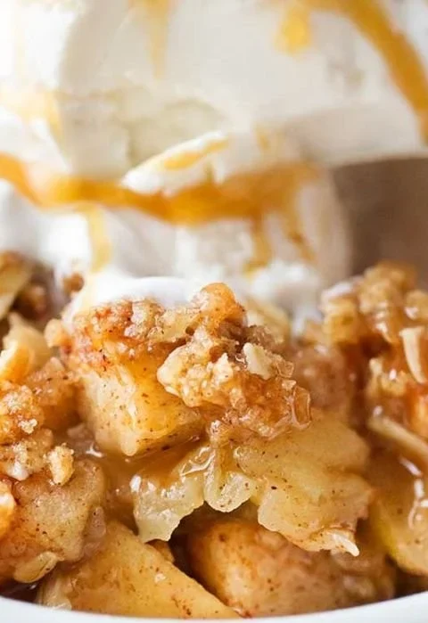 Delicious apple crisp with crispy oat topping served in a bowl