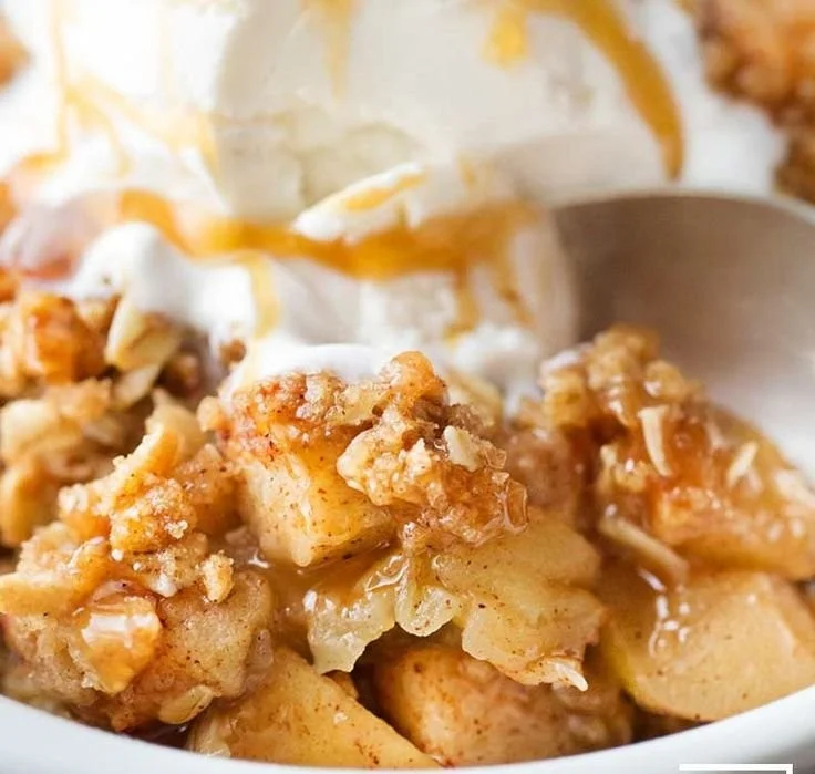 Delicious apple crisp with crispy oat topping served in a bowl