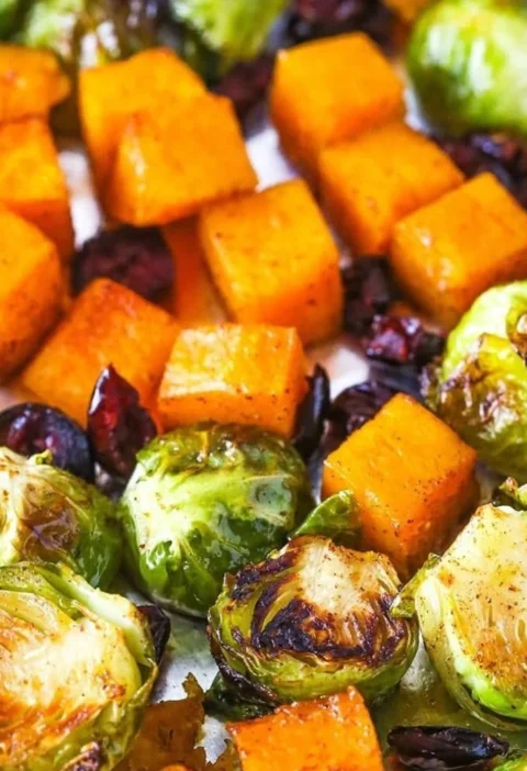 Delicious honey-glazed Brussels sprouts with butternut squash and cranberries