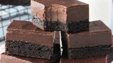 Decadent Nutella fudge brownies on a plate, ready to enjoy.