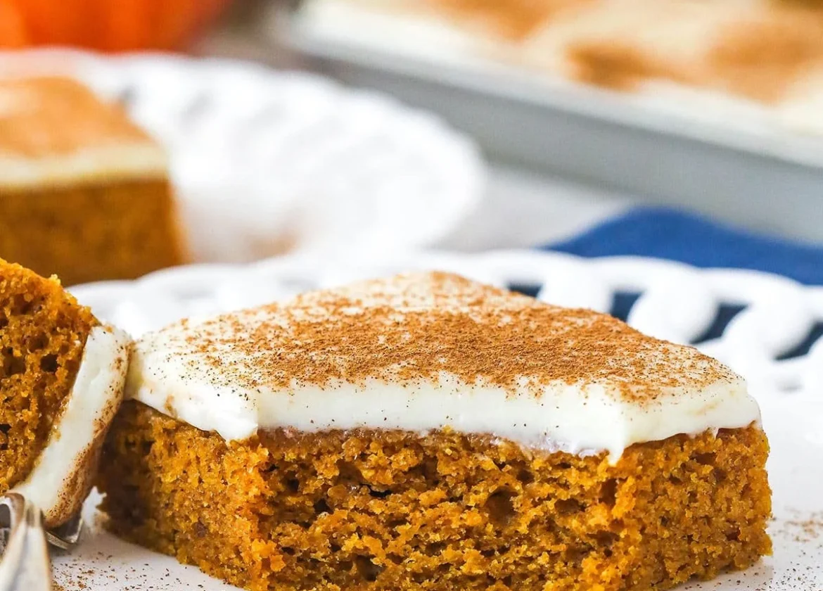 Delicious homemade pumpkin bars topped with cream cheese frosting.
