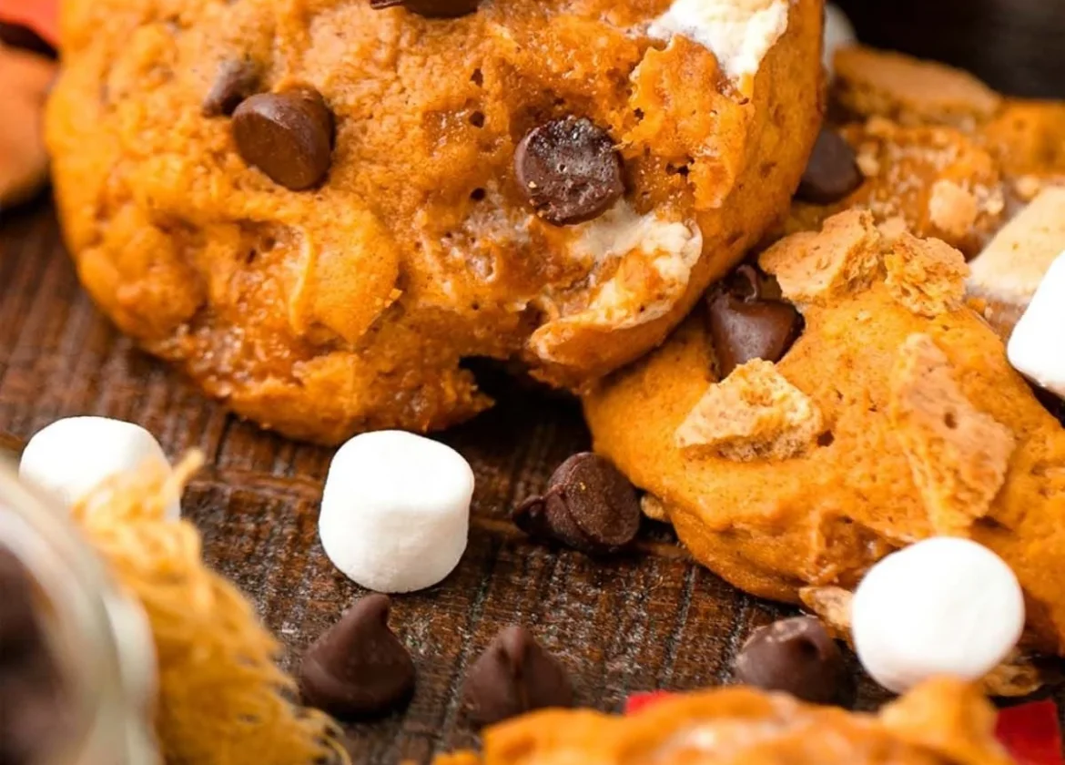 Delicious Pumpkin S'mores Cookies on a rustic wooden table