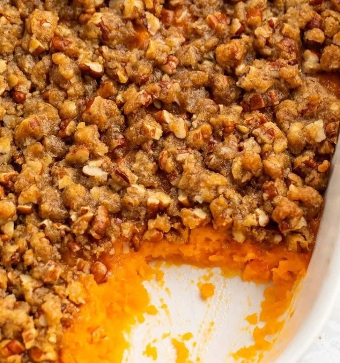 Ruth's Chris Sweet Potato Casserole topped with marshmallows and pecans.