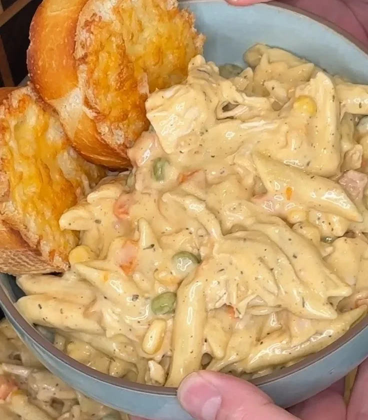 Delicious slow cooker chicken pot pie pasta in a bowl.