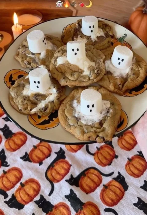 Spooky S'mores cookies decorated for Halloween with ghosts and pumpkins.