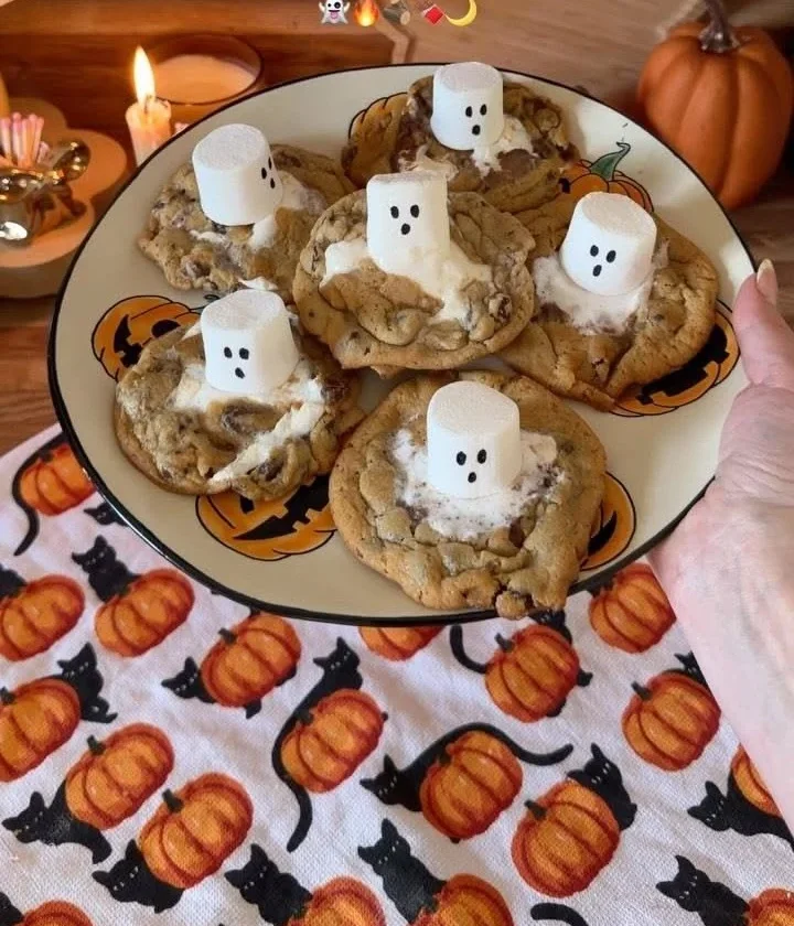 Spooky S'mores cookies decorated for Halloween with ghosts and pumpkins.