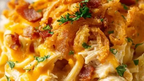 Delicious ultimate chicken casserole recipe with creamy topping and veggies