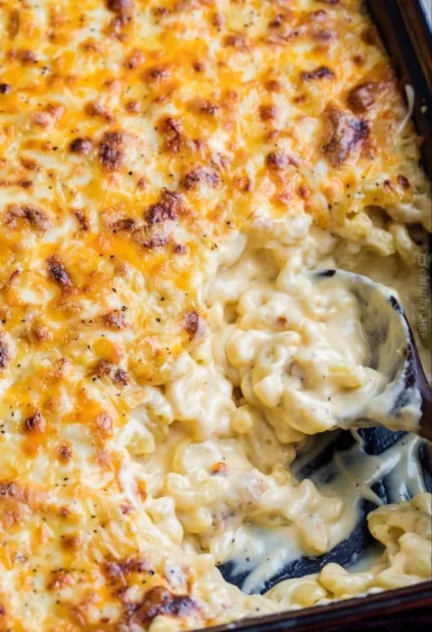 Creamy baked mac and cheese topped with breadcrumbs and baked to perfection