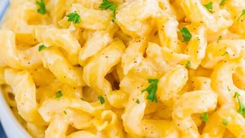 Bowl of creamy mac and cheese served with breadcrumbs on top