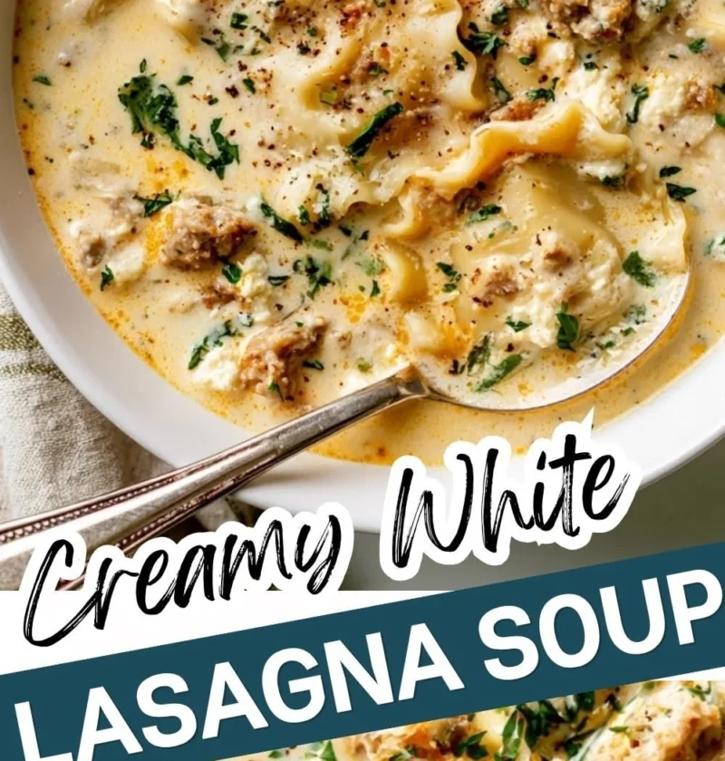 Creamy white lasagna soup in a bowl garnished with herbs and cheese