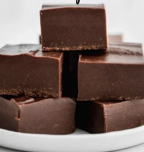 Delicious homemade fudge in a decorative box, perfect for gifts.