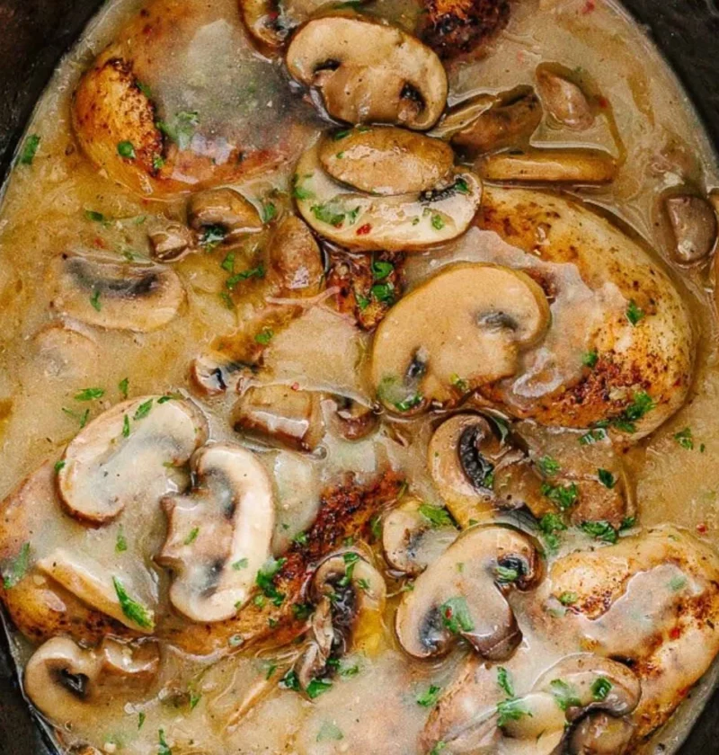 Delicious Easy Crock Pot Chicken Marsala served with mushrooms and herbs