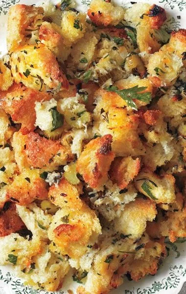 Delicious Thanksgiving stuffing recipe with fresh herbs for holiday meals.