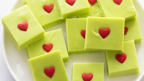 Deliciously festive Grinch Fudge dessert with green and red colors for holidays