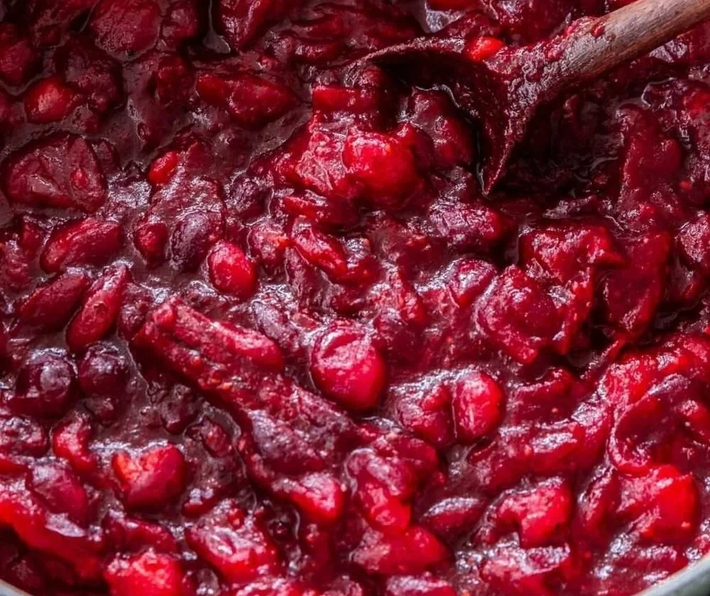 Honey Bourbon Cranberry Sauce served in a glass bowl