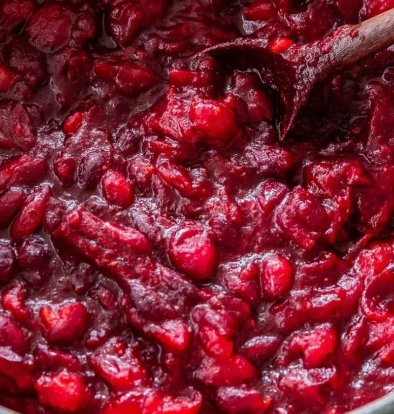 Honey Bourbon Cranberry Sauce served in a glass bowl