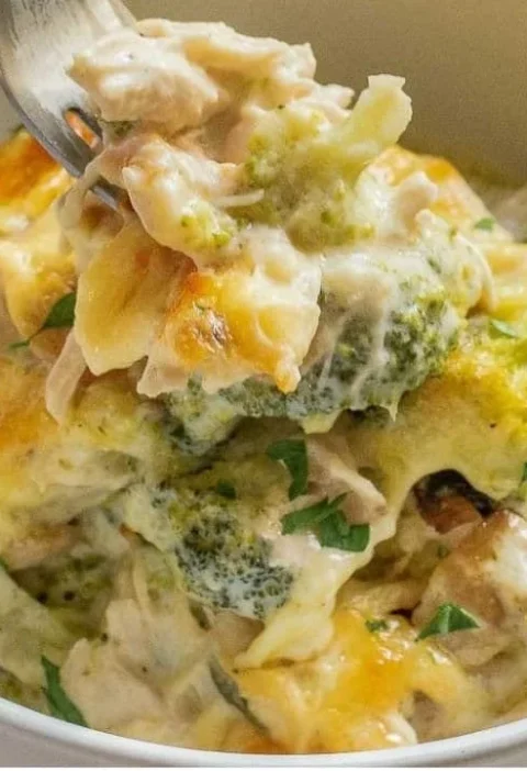 Cheesy Turkey and Broccoli Casserole topped with breadcrumbs in a baking dish.