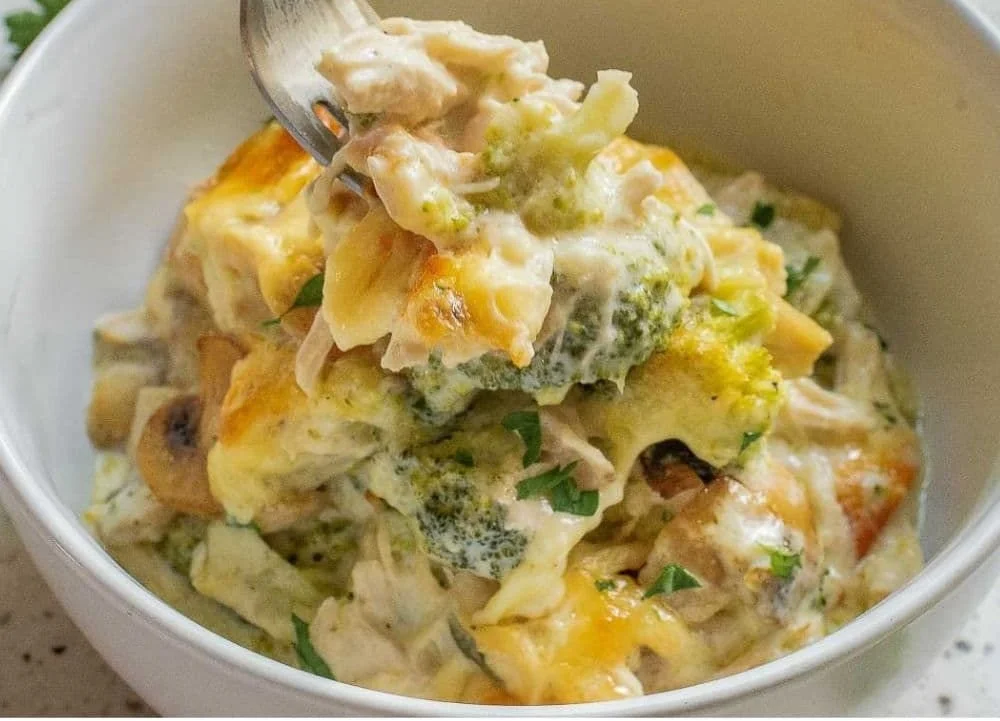 Cheesy Turkey and Broccoli Casserole topped with breadcrumbs in a baking dish.