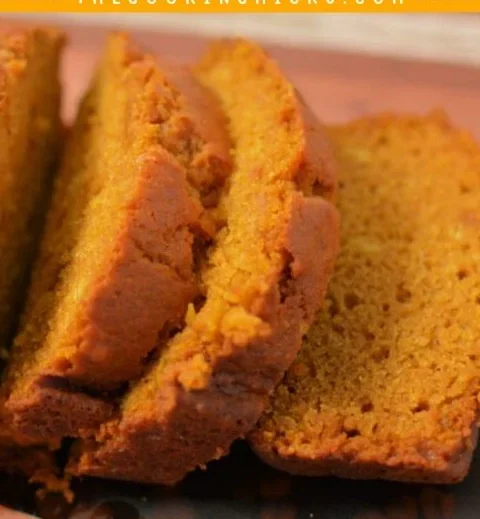 Freshly baked Libby's pumpkin bread displayed on a wooden table