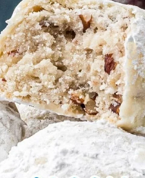 Delicious pecan snowball cookies dusted with powdered sugar
