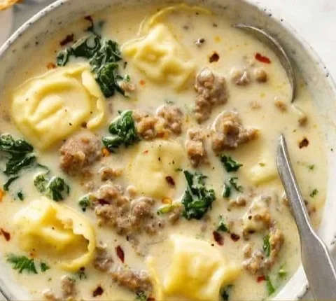 Creamy Sausage Tortellini Soup in a bowl, ready to serve