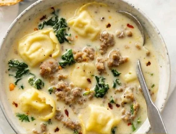 Creamy Sausage Tortellini Soup in a bowl, ready to serve