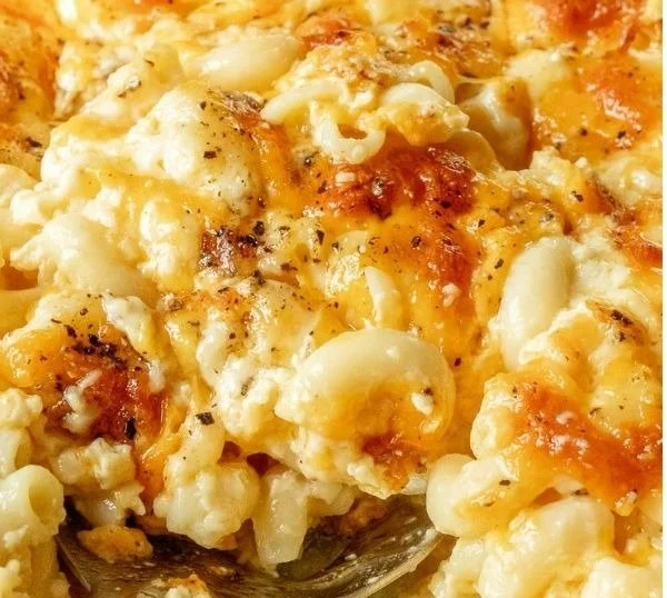 Serving of delicious Southern baked mac and cheese with a golden crust