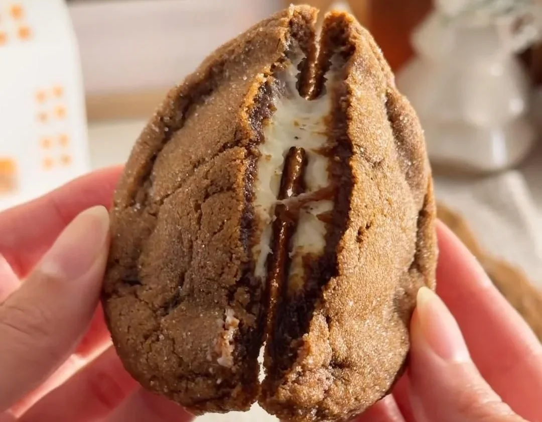 Spiced gingerbread cheesecake cookies on a festive plate.