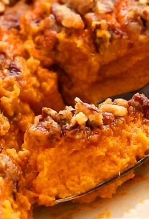 Delicious sweet potato souffle casserole topped with marshmallows