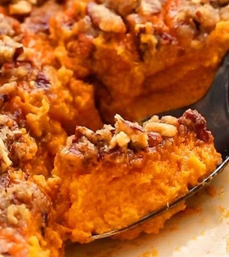 Delicious sweet potato souffle casserole topped with marshmallows