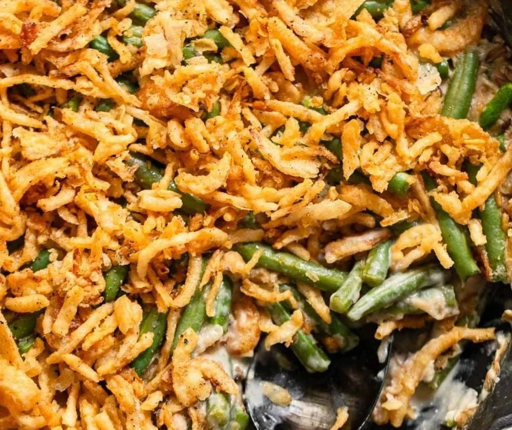 Delicious vegan green bean casserole topped with crispy fried onions
