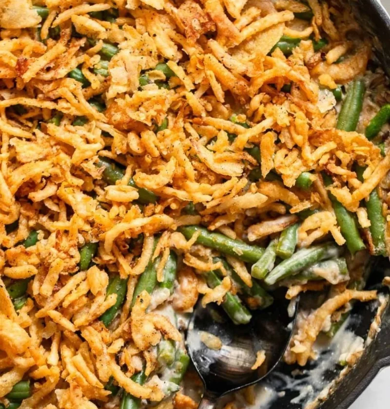 Delicious vegan green bean casserole topped with crispy fried onions